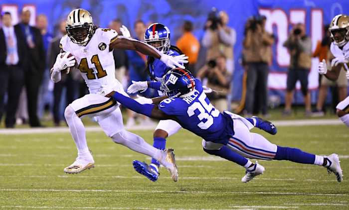 New Orleans Saints running back Alvin Kamara (41) runs for a touchdown against the Giants. Mandatory Credit: Robert Deutsch-USA TODAY